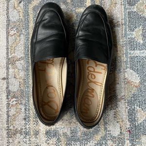 Black leather loafers